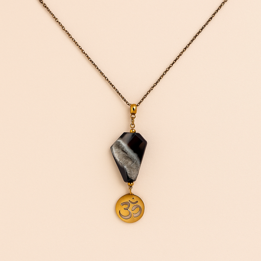 Black banded agate gemstone pendant with gold Om symbol charm on a delicate gold chain – Om & Agate Pendant by THE AURA CO.