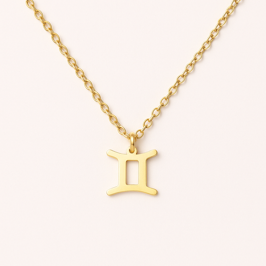 Gold Gemini zodiac symbol pendant necklace on a delicate gold chain – Zodiac Pendant Necklace by THE AURA CO.
