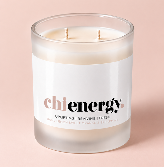 Chi Energy aromatherapy candle in a frosted glass vessel with two wicks – Mood Candle by THE AURA CO.
