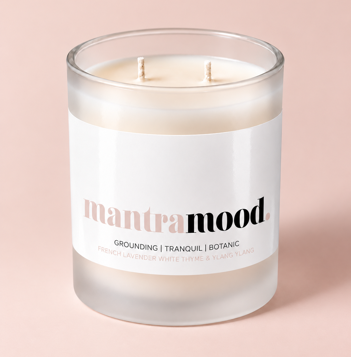 Mantra Mood aromatherapy candle in a frosted glass vessel with two wicks – Mood Candle by THE AURA CO.
